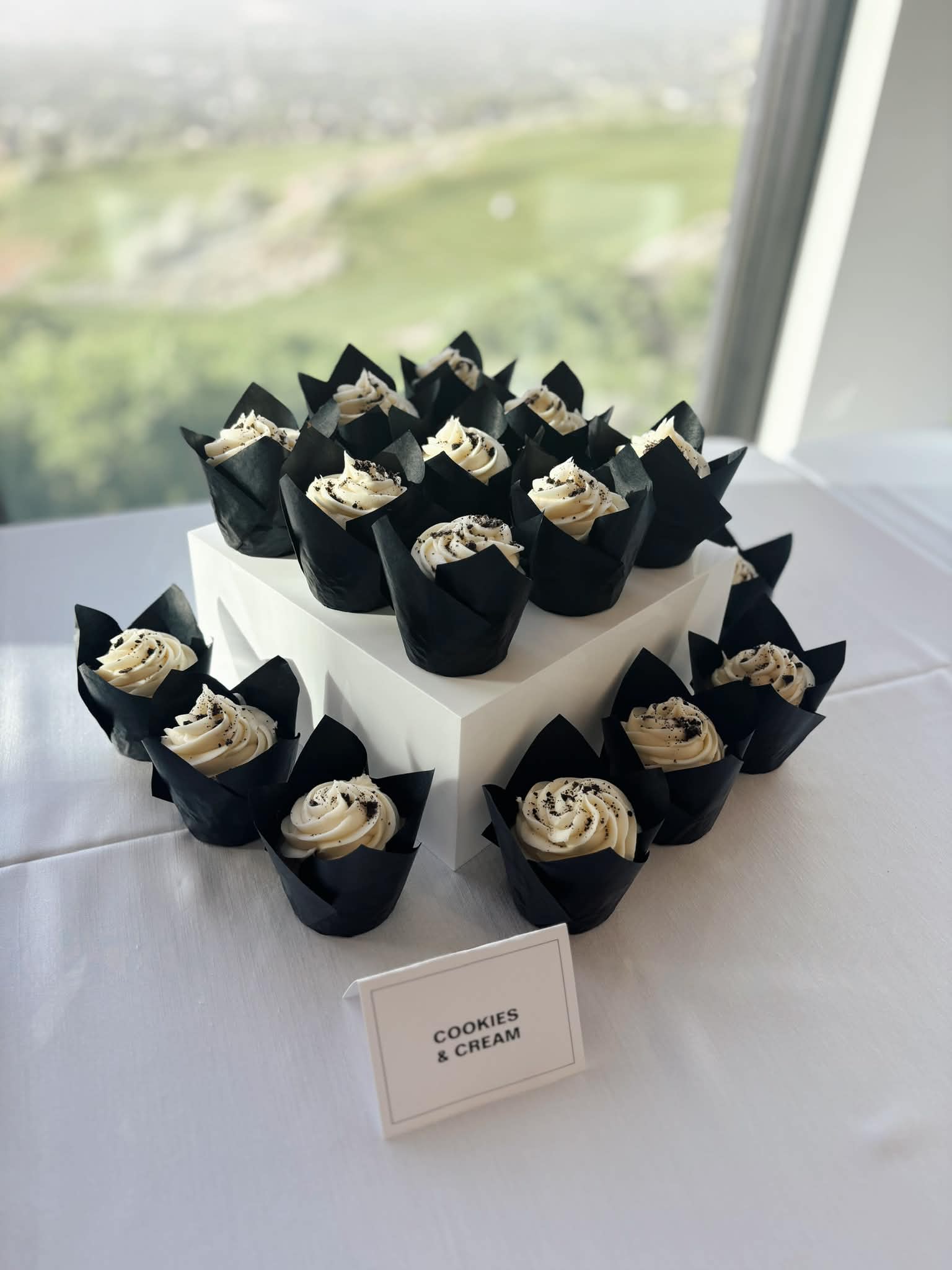 Cookies and cream cupcakes in black tulip wrappers